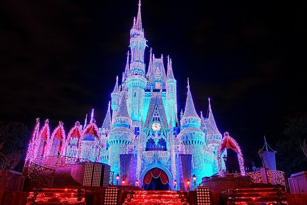 Fairy-tale palace with illumination at night