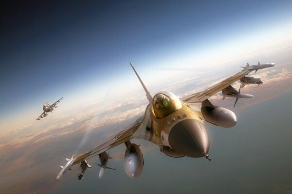 Two combat aircraft flying in the stratosphere