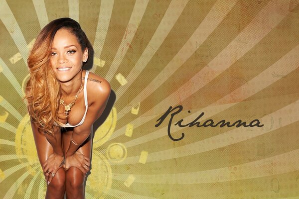 Tanned Rihanna smiles at the camera