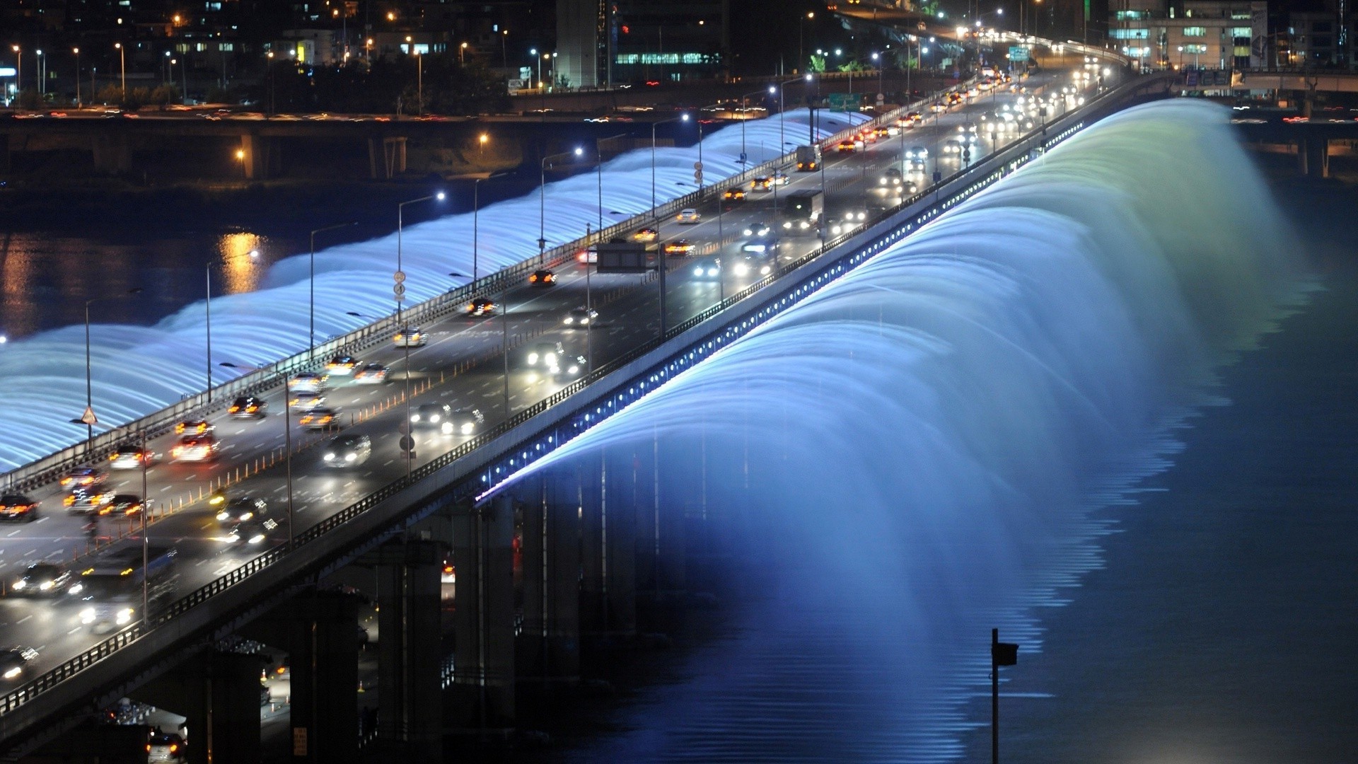 city and architecture transportation system bridge road city travel evening blur dusk highway traffic street car river urban water building downtown architecture light bus