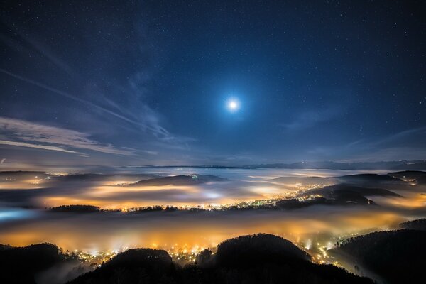 Night landscape with the moon in the sky