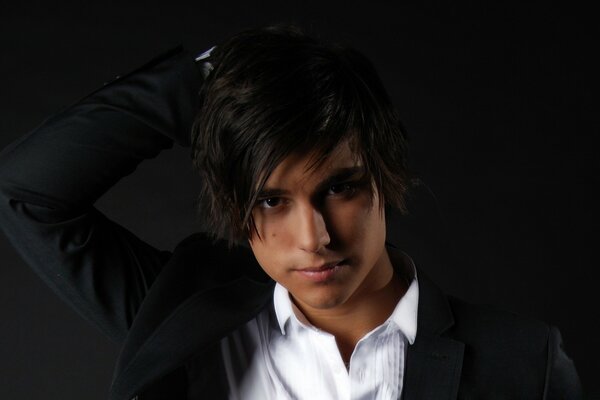 Eric Saade. Portrait of a singer in a suit