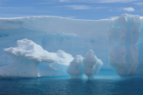 Iceberg on the water under the sun