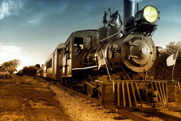 Train sur le chemin de fer avec le drapeau américain