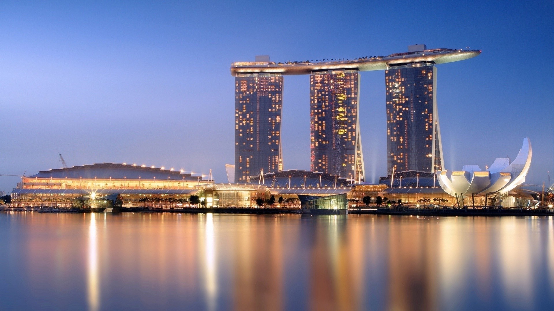 city water sky architecture sunset travel dusk river reflection evening modern outdoors bridge building cityscape waterfront skyline dawn