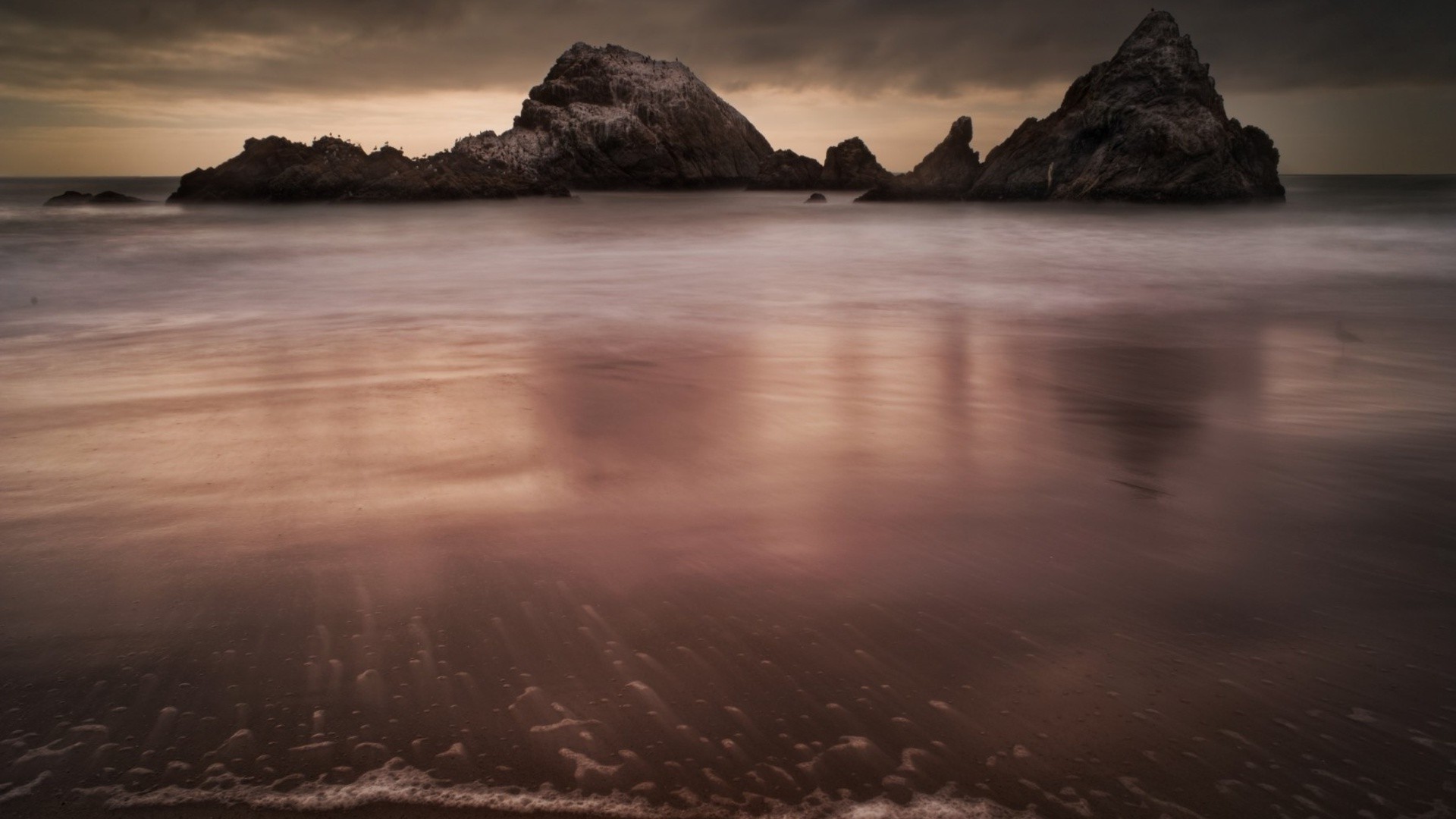 rocce massi e rocce massi e rocce tramonto acqua spiaggia mare oceano alba sera paesaggio riflessione paesaggio mare crepuscolo cielo viaggi lago sole tempesta isola roccia