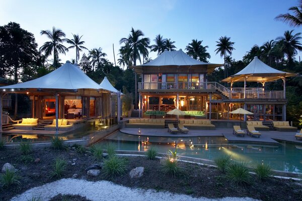 Luxury cabins and a swimming pool at the resort