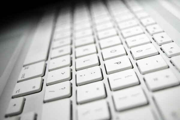 Keyboard with white keys and black symbols