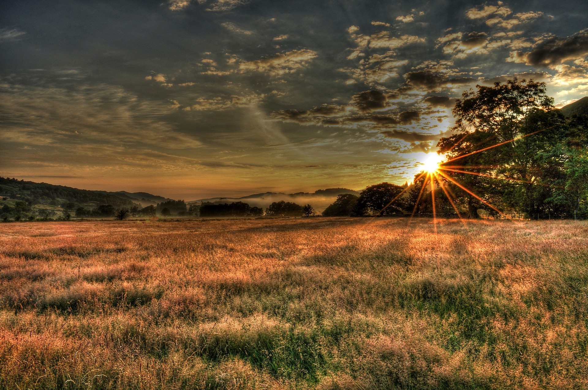 the sunset and sunrise landscape sunset sun dawn nature sky field grass rural fair weather countryside evening summer