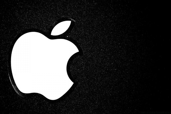 Logo Apple na ciemnym tle