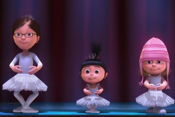 Pequenas bailarinas em tutu branco no palco