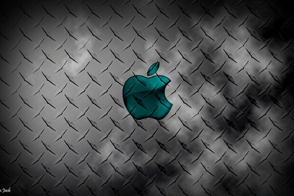 Turquoise apple on a gray background for the desktop