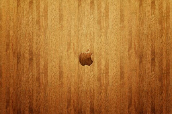 Logotipo de Apple en el piso de madera