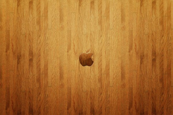 Логотип яблоко на деревянном полу