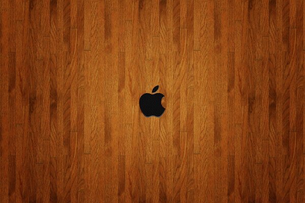 The apple logo is on the wood