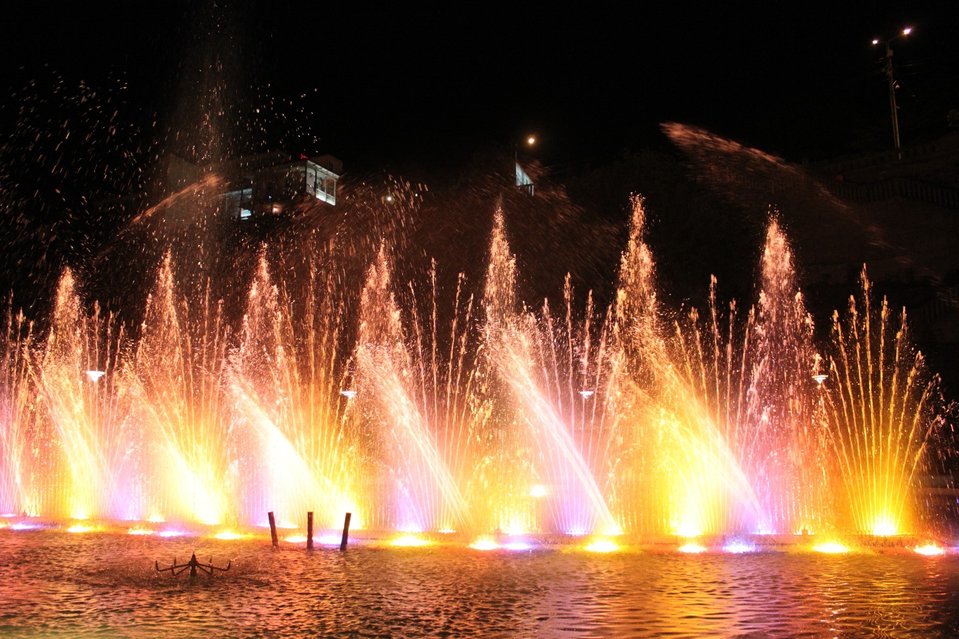 fountains flame festival fireworks light smoke energy evening explosion hot landscape