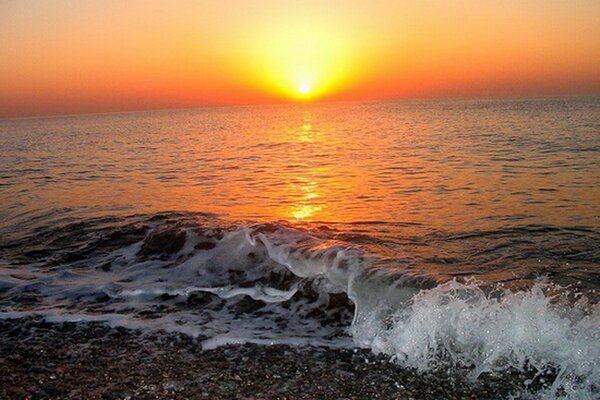 Fiery sunset on the background of the sea