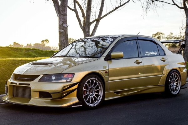 A gold-colored sports car