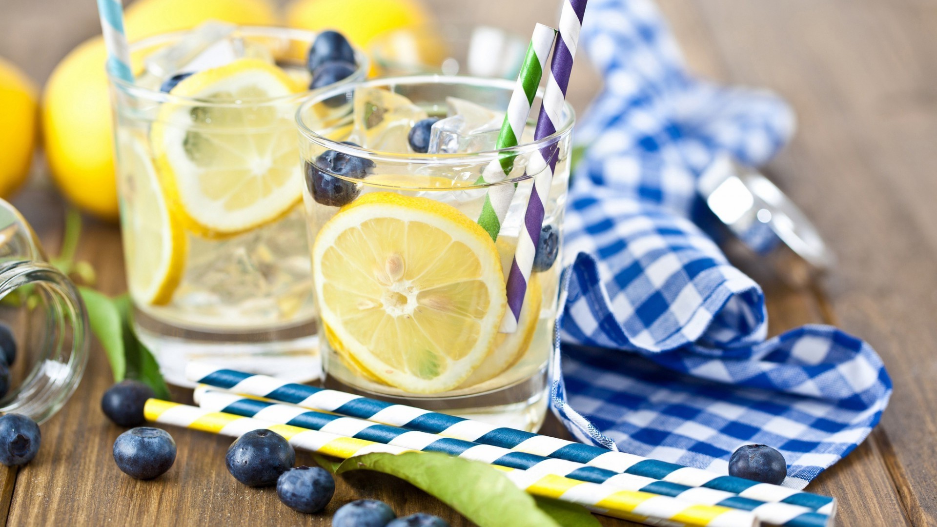 drinks glass drink fruit summer juice table lemon desktop wooden cold food ice healthy liquid