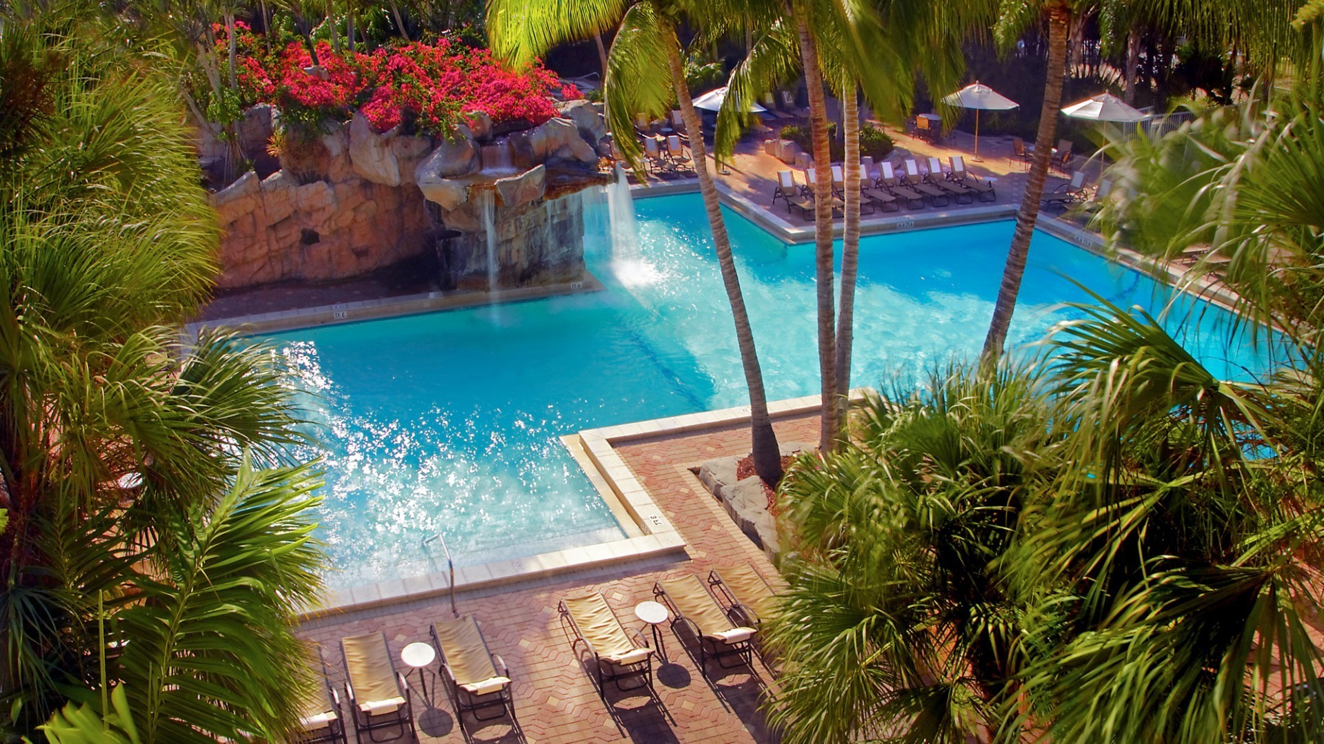 pools pool tropical resort swimming swimming pool hotel vacation water palm relaxation travel poolside exotic turquoise paradise summer leisure luxury beach