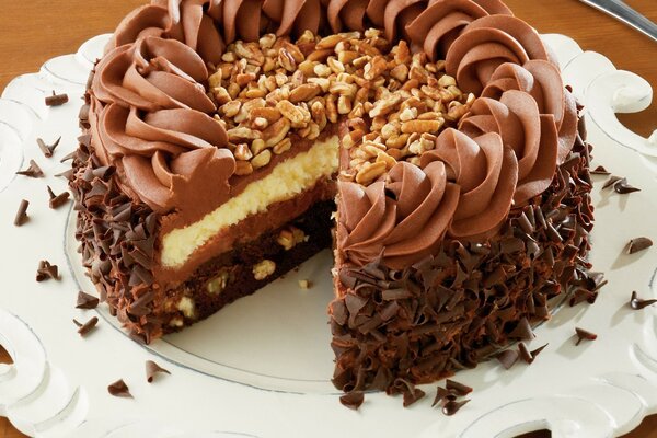 Cake on a tray with a cut piece