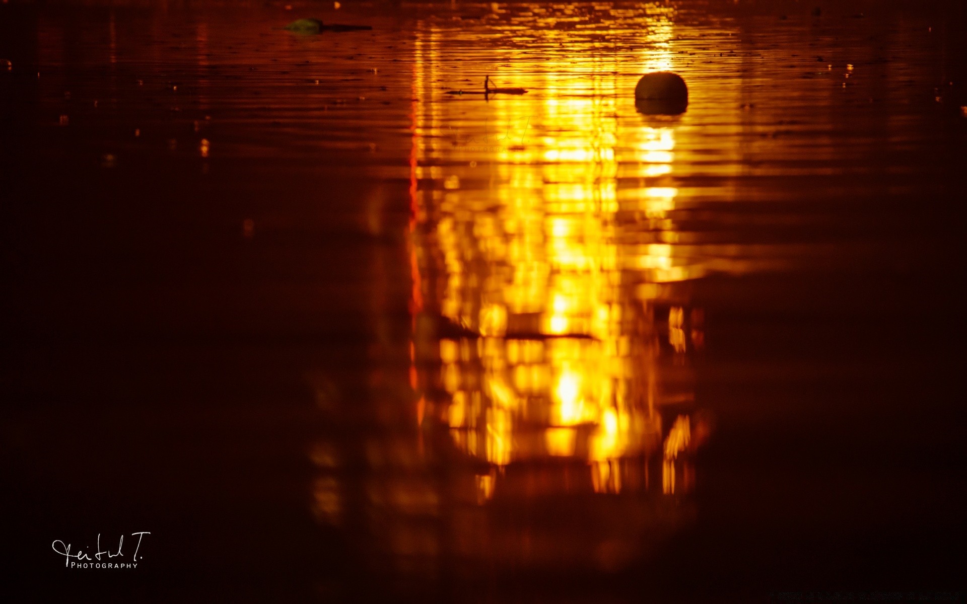 droplets and water reflection blur dark water abstract light sunset