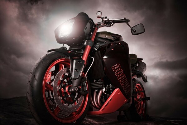 Red sports bike on a black sky background