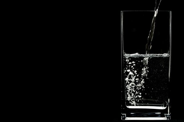 Monochrome frame. Water. Glass. Dark space