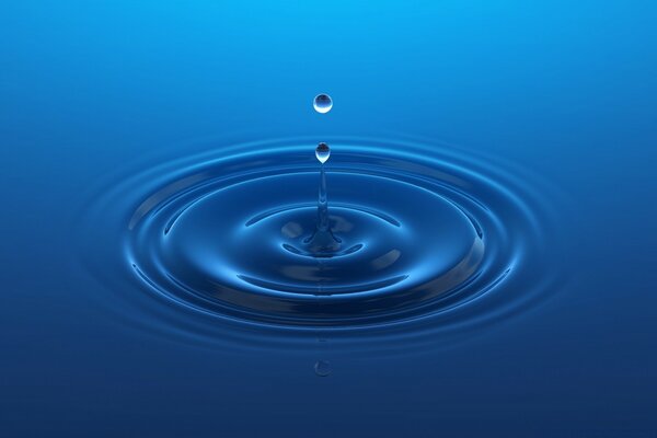 A drop fell into the blue water