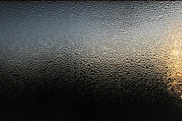 Water texture on the glass on the desktop