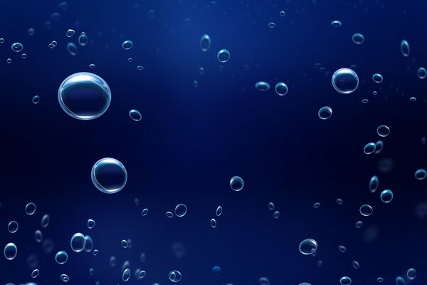 Air bubbles in blue water