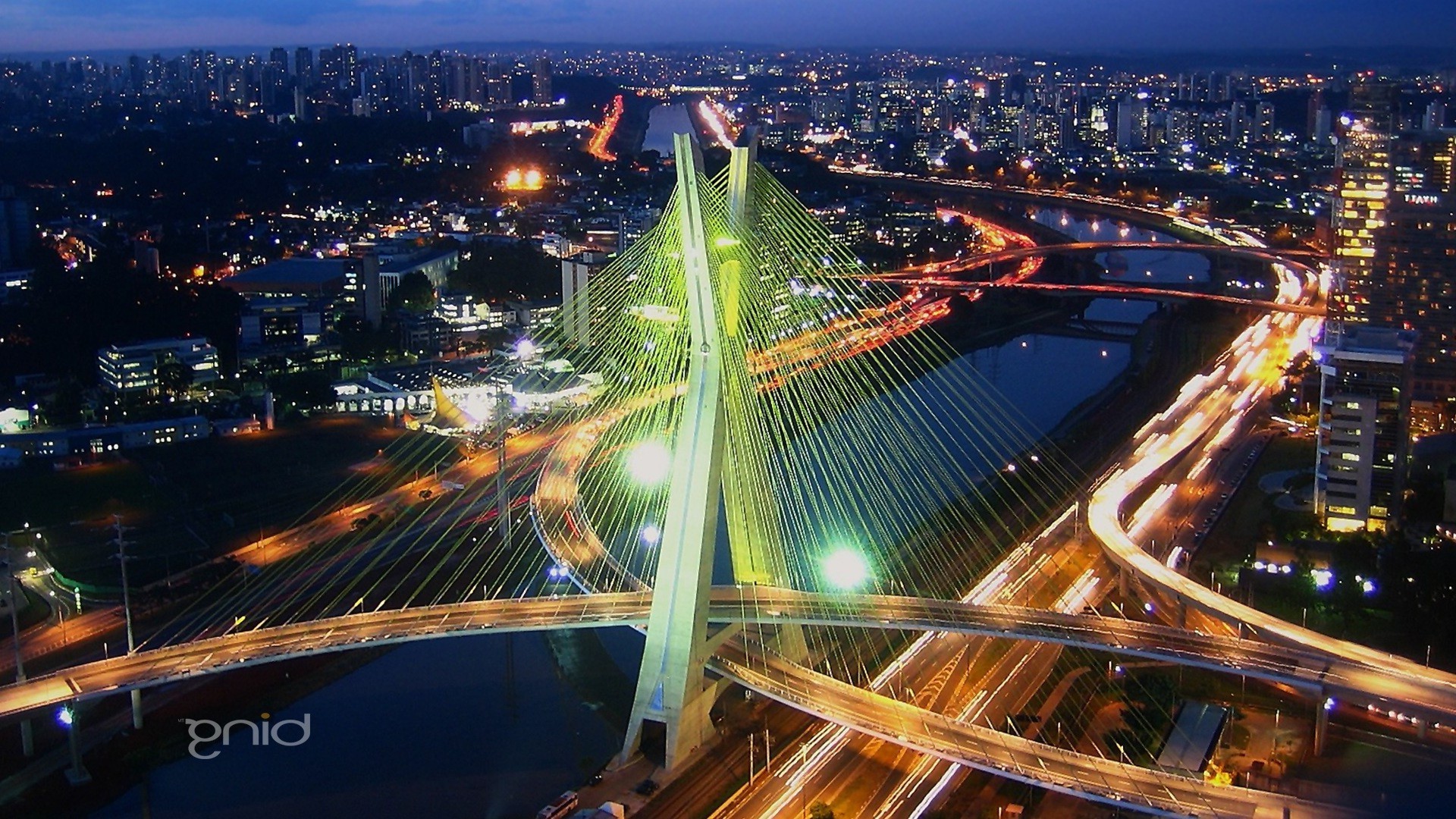 city traffic dusk road cityscape architecture highway evening travel downtown bridge urban transportation system skyscraper building skyline modern light business illuminated