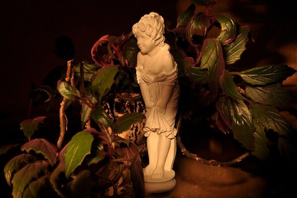 Sculpture of a creative woman on the table