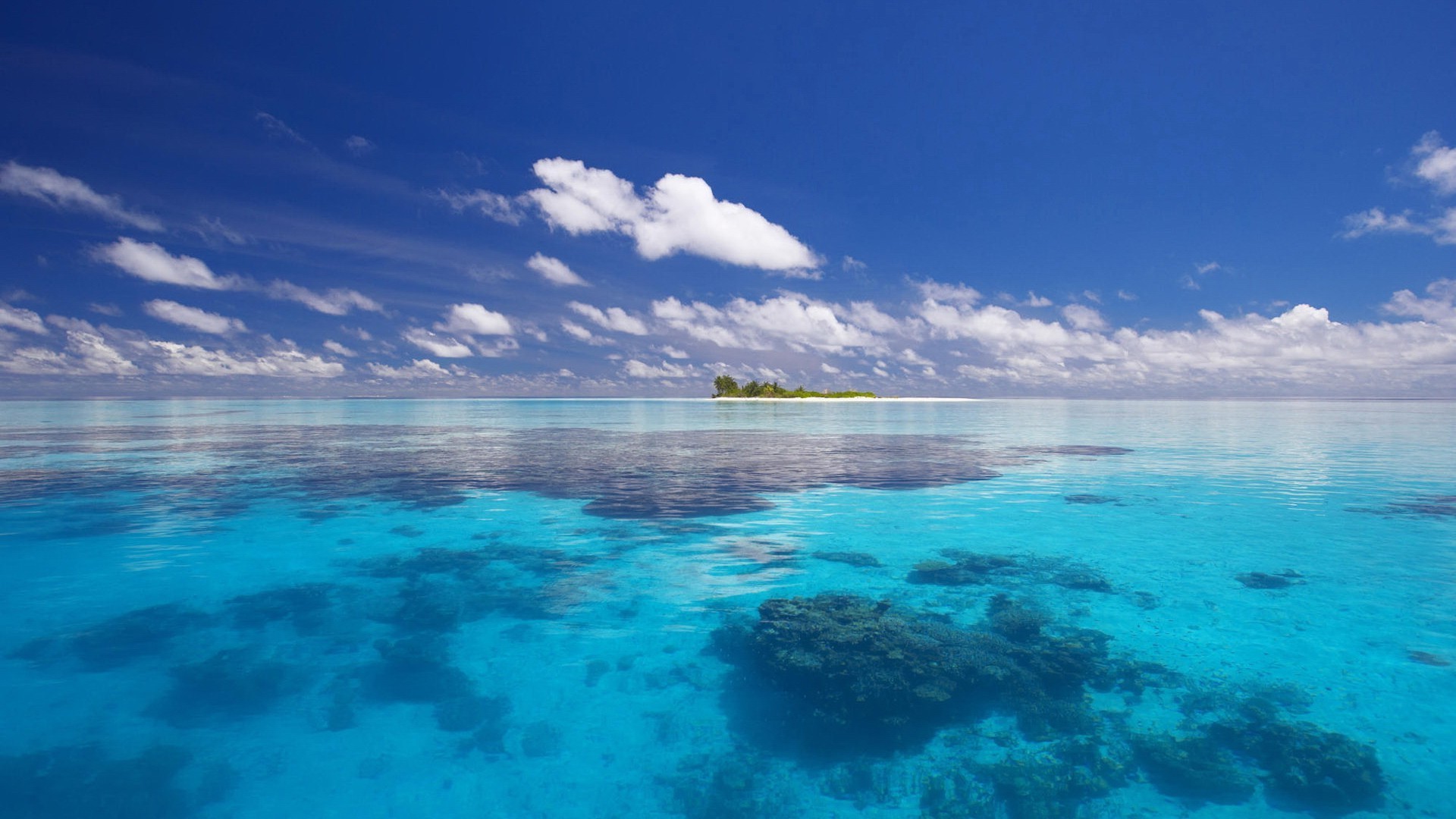 mar e oceano água viagens tropical praia mar céu verão idílio areia mar oceano natureza paisagem paisagem ilha ao ar livre bom tempo turquesa sol