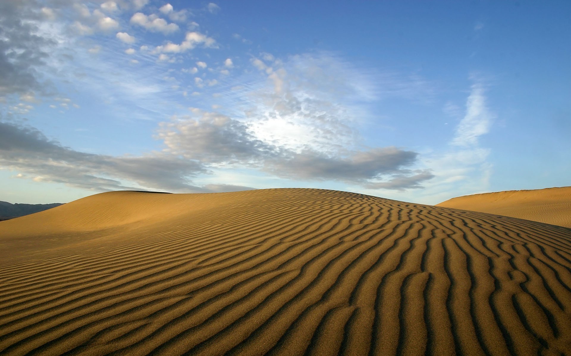 brands and logos sand dune desert dry arid barren alone hot adventure drought travel sun sky