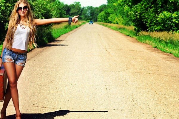 Girl in shorts on the road