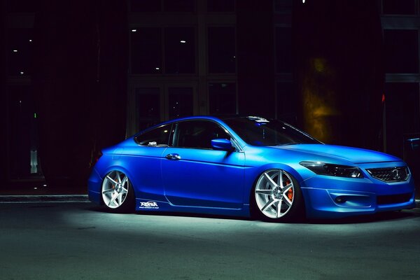 Blue sports car in the night