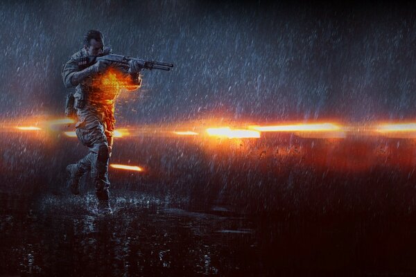 Homme avec des armes flamme et pluie