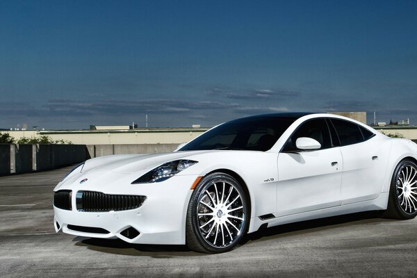 White sports car in the parking lot