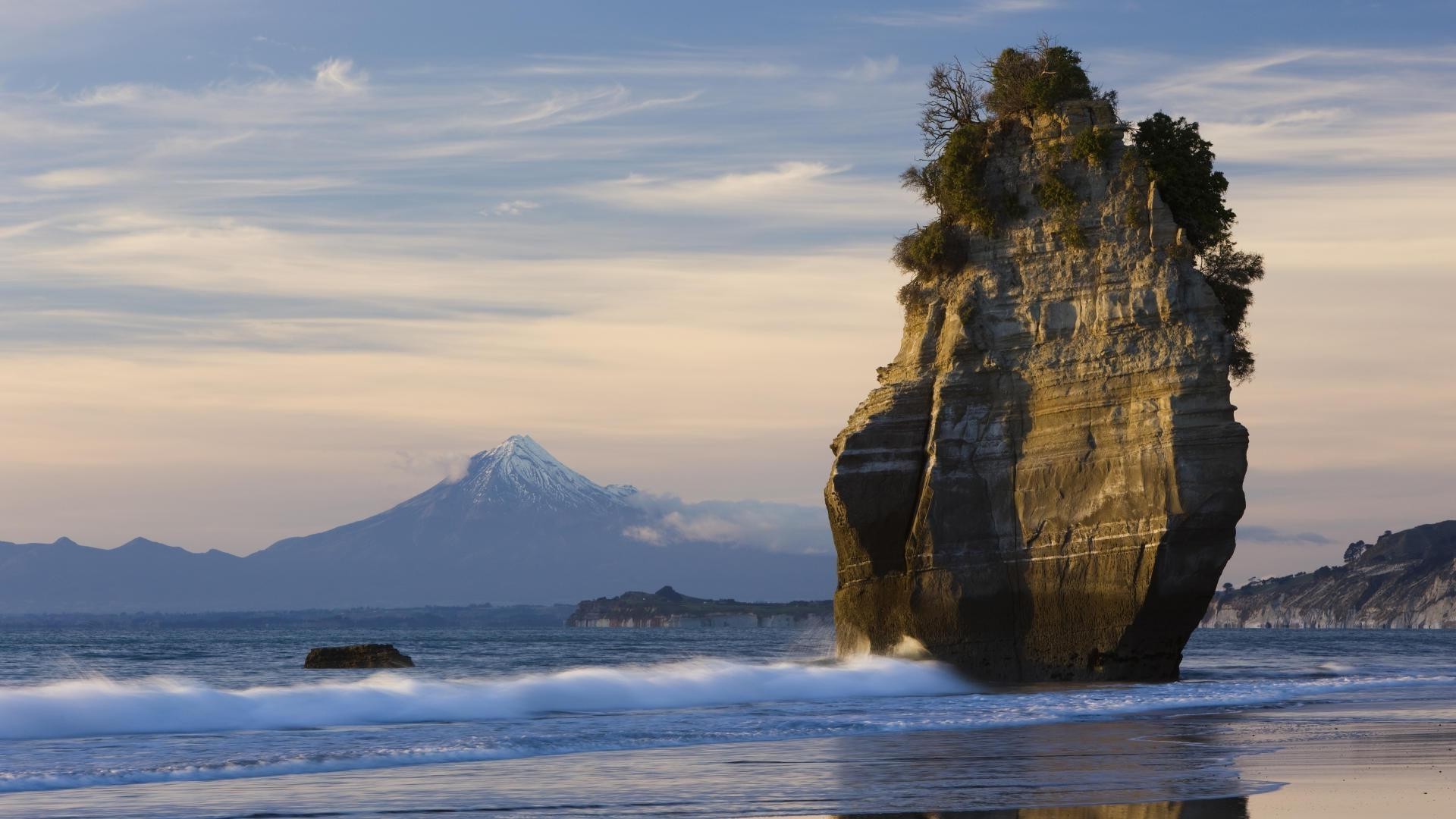 rocks boulders and stones water travel landscape ocean nature seashore sea sky rock outdoors sunset beach mountain