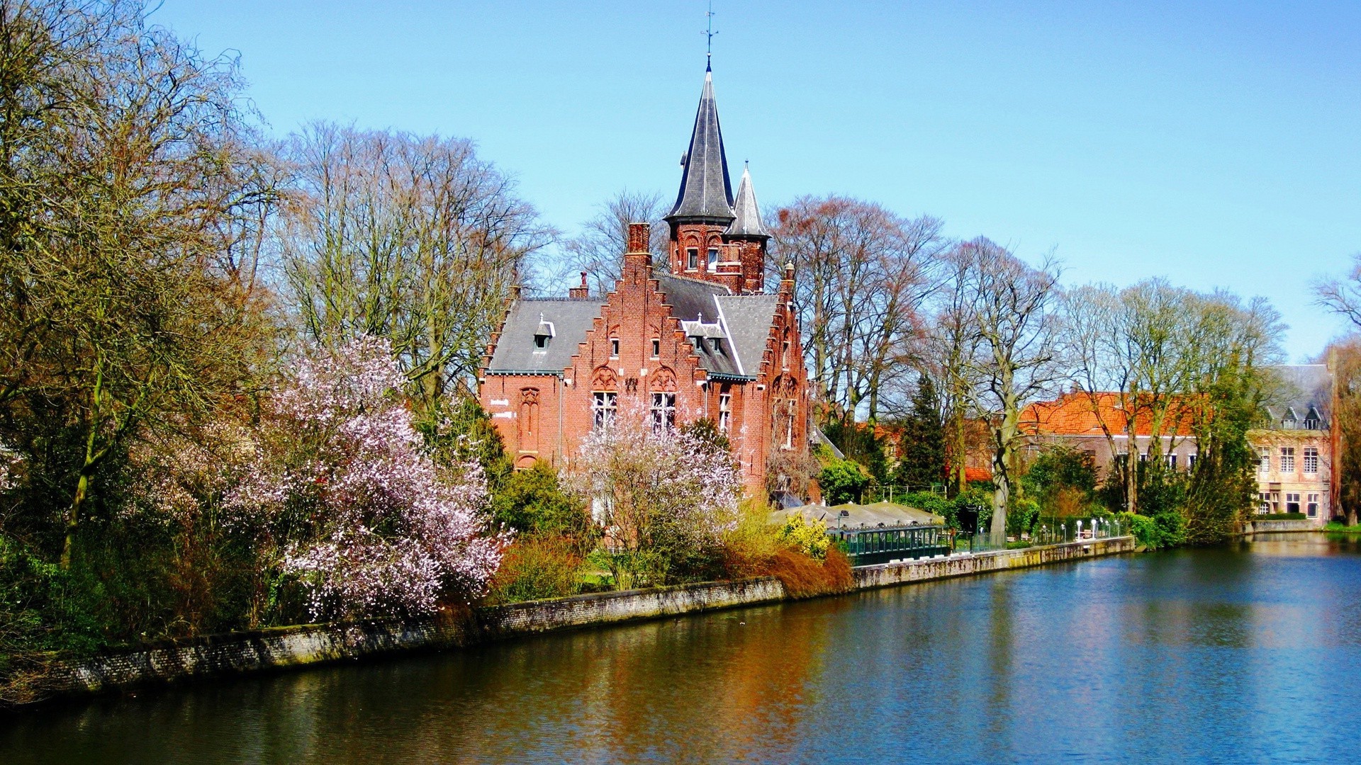 ancient architecture architecture river church building water travel old sky tree gothic lake outdoors city reflection tower traditional canal bridge castle