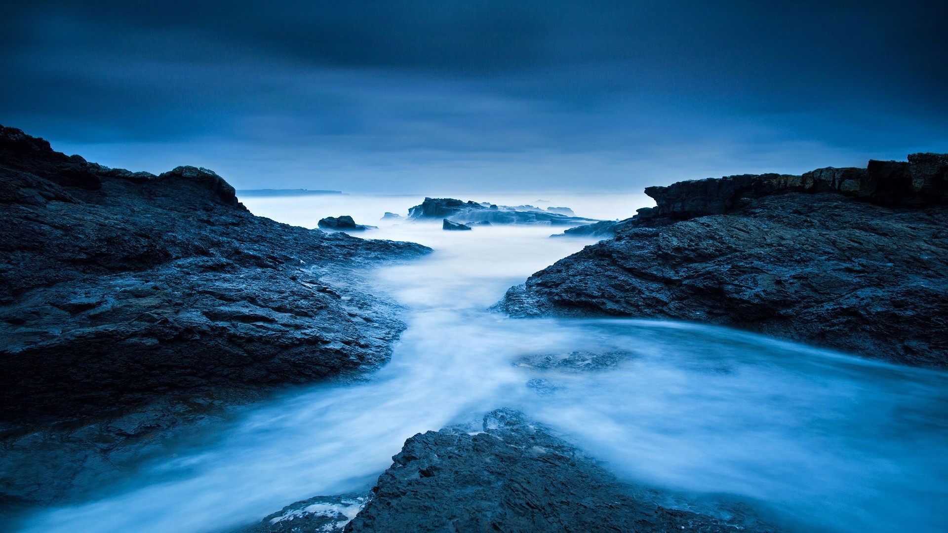 winter water sea ocean seashore travel sunset beach landscape sky seascape nature dawn outdoors rock evening dusk surf