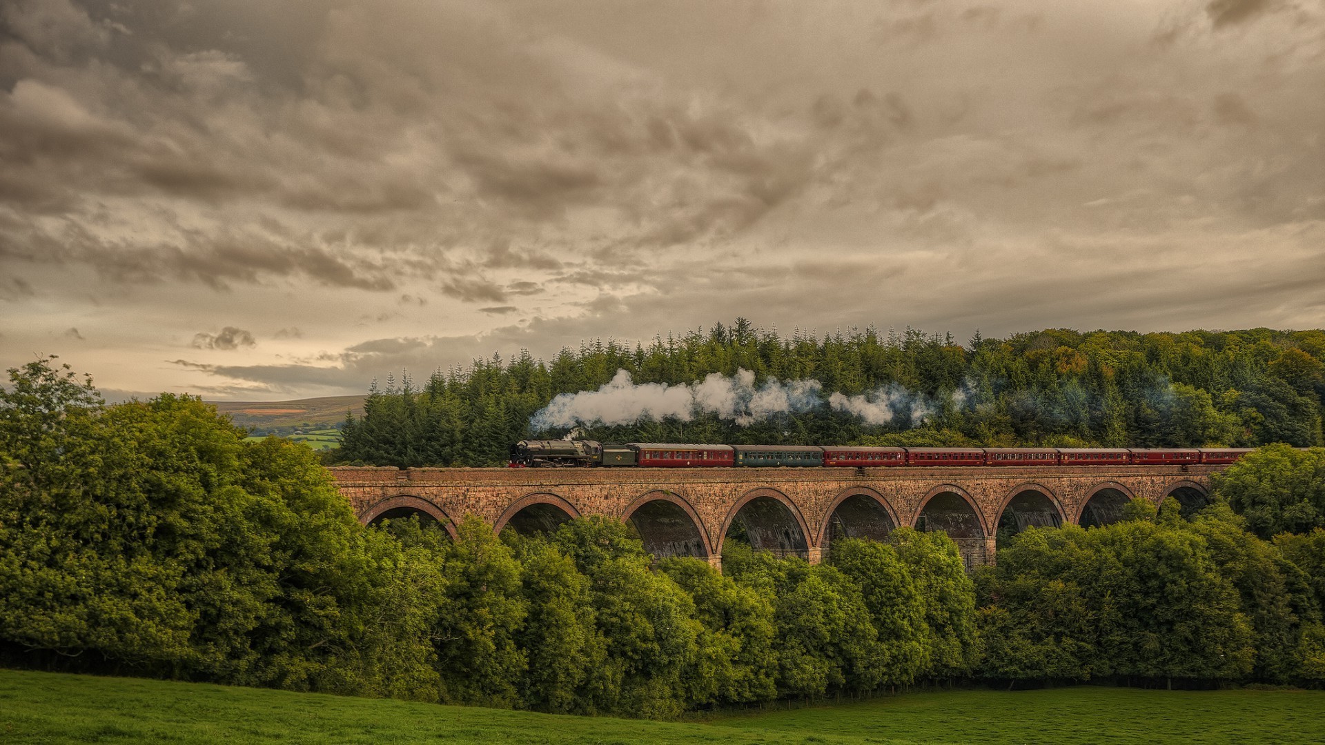 trains tree bridge daylight travel river outdoors landscape architecture sky water