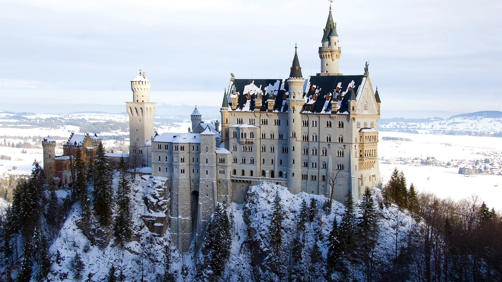 locks architecture travel winter building snow sky outdoors city old gothic castle sight tower tourism town river traditional church