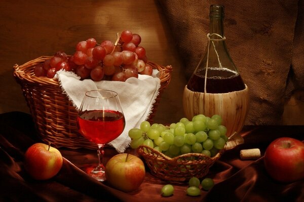 Still life with a glass of wine and grapes