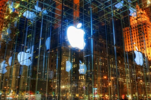 Apple against the backdrop of the urban landscape