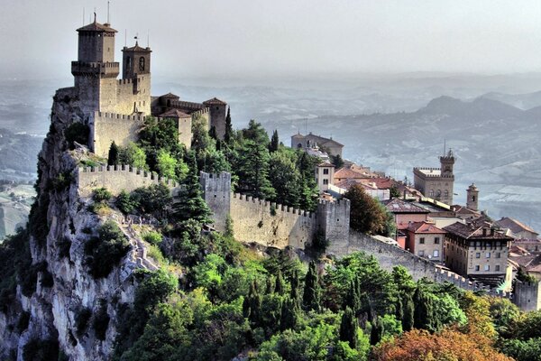 Gothic castle over the precipice of the mountains