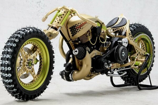 An unusual motorcycle with studded treads