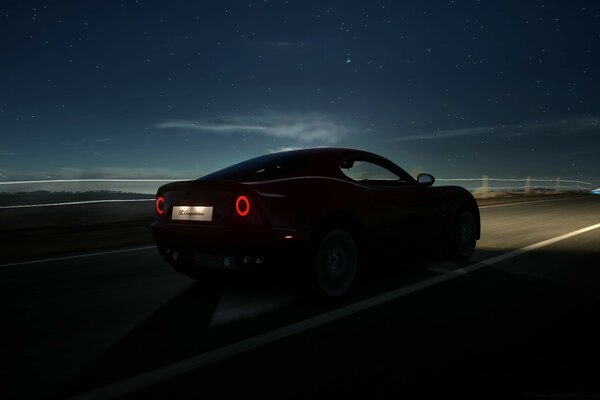 Voiture rapide sur la route de nuit