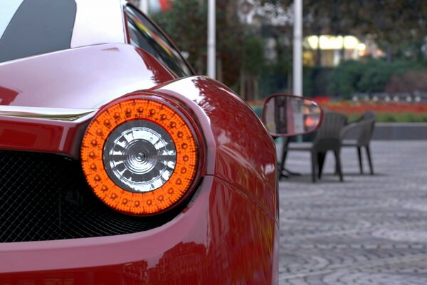 Car headlight in orange frame